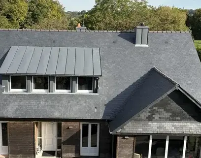charpentier à Le Genest-Saint-Isle - image 3