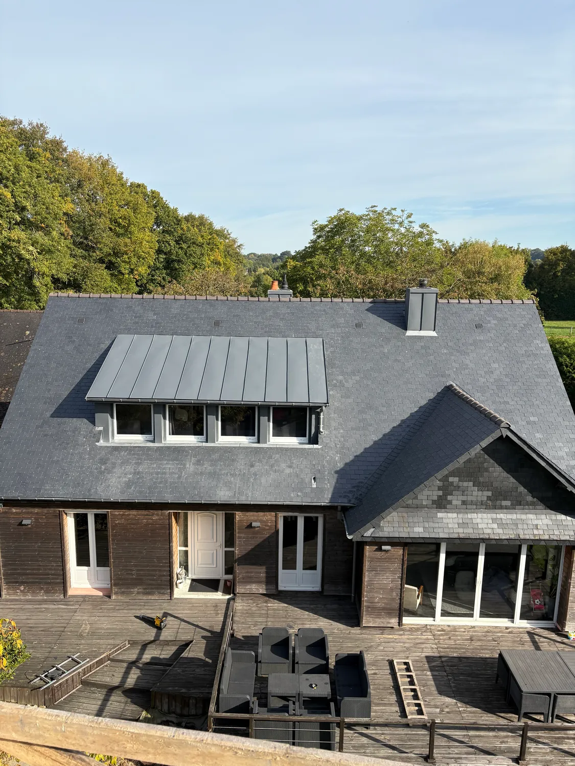 demoussage de toiture andouille